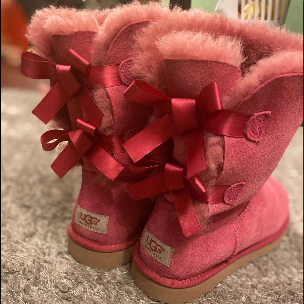 Pink UGG boots with bows on the back🎀🎀
